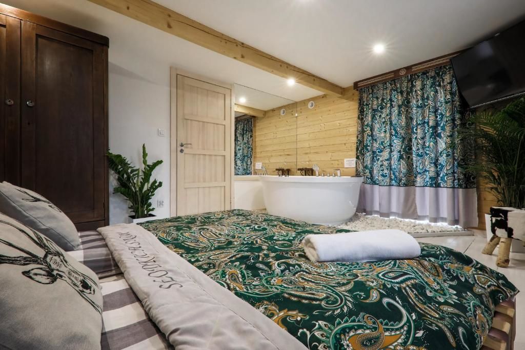 Проживание в семье GÓRALSKA VILLA APARTAMENTY Z JACUZZI & HOME SPA & Zakopane Поронин